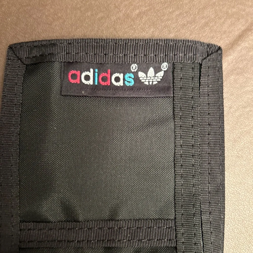 Vintage adidas spell out black Velcro wallet. Euc